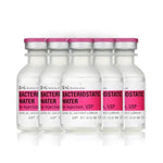 A row of Henry Schein 30ml Bacteriostatic Water for Injection (100 Pack) with pink caps.