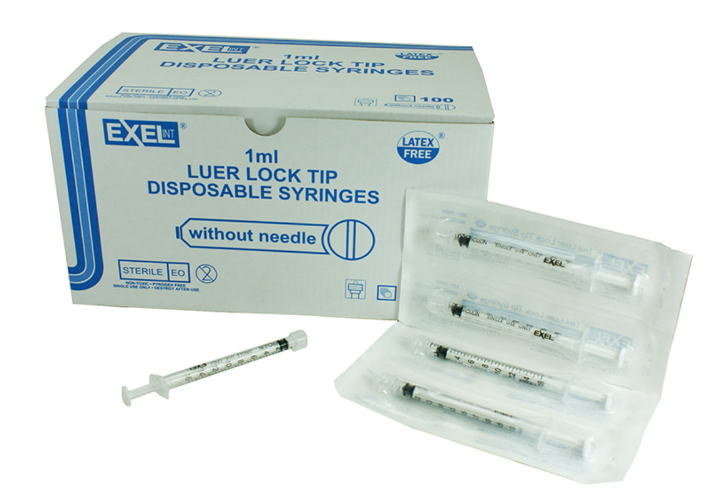 Box labeled "Exel 1cc (1mL) Luer Lock Tip Syringes" by MedPlus with 100 sterile syringes per box; four individually wrapped syringes and one unwrapped syringe are displayed in front.
