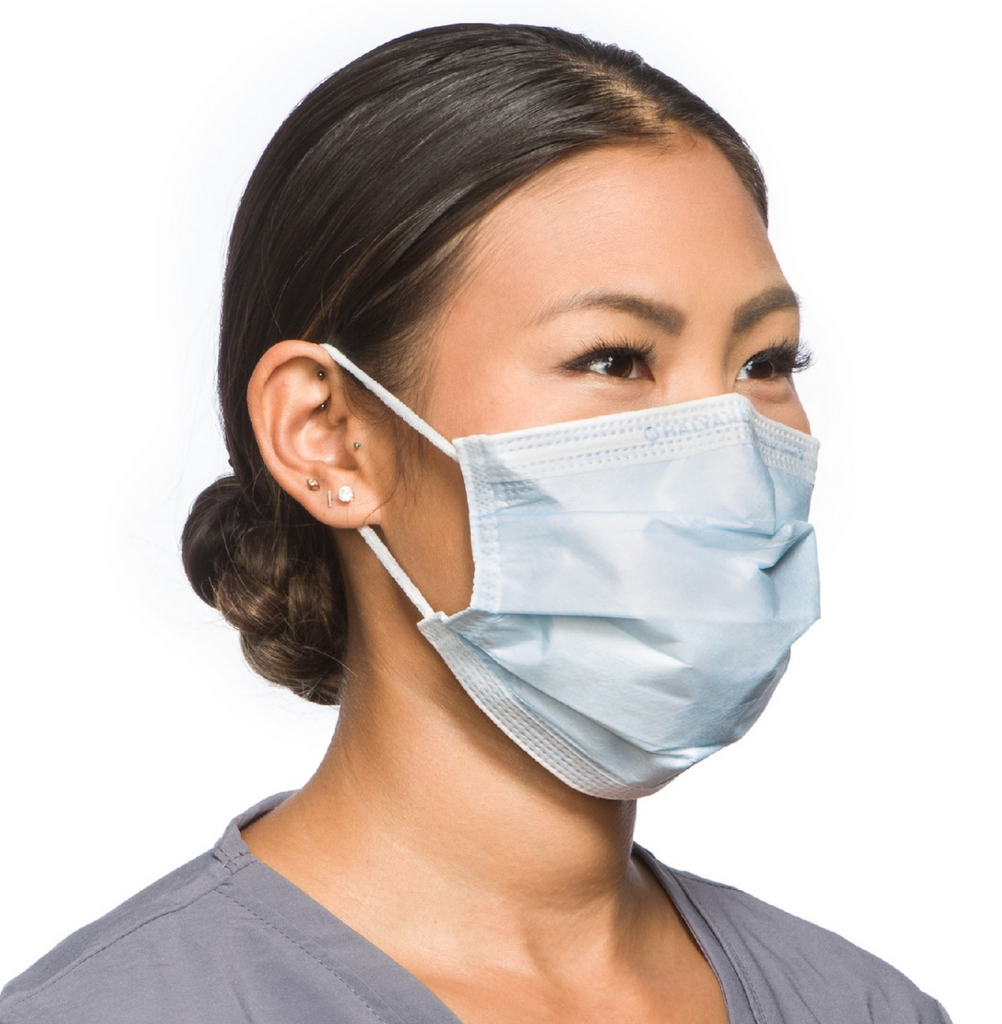 A woman wearing a MedPlus Halyard Fluidshield* Level 2 Procedure Mask (ASTM F2100-11 Level 2 Protection) (1 Box of 50).